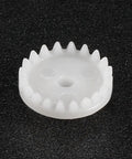 Close-up of a single plastic gear from the 50 Pack Plastic Gears 20 Teeth C202A Reduction Worm Gear Set For RC Cars And Robots.