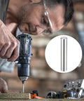 Man using a drill with a 72 Pack Pro Grade Workhorse Dowel Pins, Precision Ground 3 Mm Hardened Steel Alignment Pin shown in close-up.