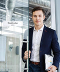 Man in office with Crystal Clear Acrylic Wall Name Plate Holder 2 x 8 Inch Pack of 20 With Adhesive Tape Mounts.