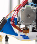 3D printer using 50 Piece Mk8 3D Printer Nozzle Set Hardened Steel Stainless Steel Brass For CR 10 Ender 3 with mixed nozzles in action