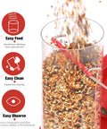 Close-up of a heavy-duty clear tube bird feeder with seeds pouring in, showing easy fill feature with 6 feeding ports and squirrel deterrent.