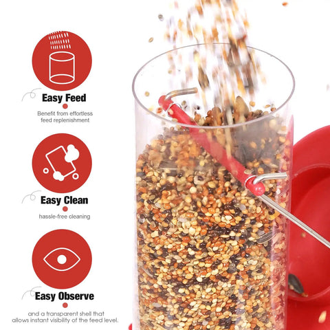 Close-up of a heavy-duty clear tube bird feeder with seeds pouring in, showing easy fill feature with 6 feeding ports and squirrel deterrent.