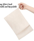 Heavy Duty Canvas Lewis Ice Crushing Bags 2 Pack Bartender Gear with Tight Seal Flap held by hand.