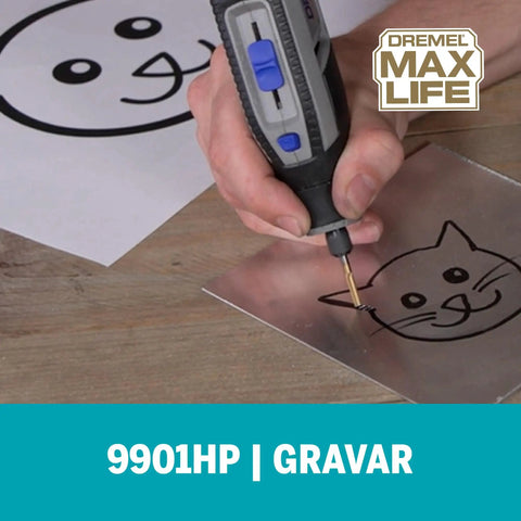 Person using the 9901HP One Eighth Inch Cylinder Tungsten Carbide Beefy Performance Rotary Carving Bit Titanium Nitride Coated for engraving a cat design on metal.