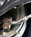 Built Tough Golden Alloy Castle Nut Kit for Go Kart Steering Rod Replacement fitted on tire.