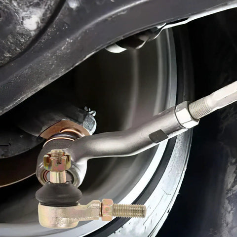 Built Tough Golden Alloy Castle Nut Kit for Go Kart Steering Rod Replacement fitted on tire.