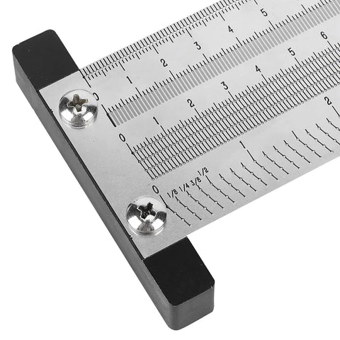 Close-up of stainless steel metric marking ruler for woodworking high precision scribing gauging tool anodized surface pro grade T square 12 inch with horizontal vertical parallel and right angle lines for accurate measurements.