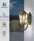Outdoor Porch Light With Built In GFCI Outlet And Two Outlets Black Roman Aluminum Wall Sconce With Water Glass For Front Door Or Garage Entryway Dusk To Dawn Exterior Lighting Farmhouse Style on rainy wall