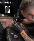 Artist using Cordless Tattoo Gun With 2300mAh Battery in dot mode on a detailed arm tattoo.