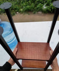 Heavy Duty Floating Shelf Bracket Ceiling Mount Metal Pipe Shelf Wrought Iron Storage Rack For Kitchen Bar Dining Room Built Different Holds 110 Lbs Easy With Screws Included, hands holding bracket with water bottle.