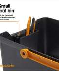 Close-up of Portable Garden Tool Caddy With Locking Handle And Removable Bin, showing small tool bin with snips, wall-mount design.