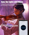 Woman playing violin with Smart RGB E12 Base Light Bulb Dimmable Color Changing With Alexa And Google Home app interface displayed. 