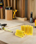 Heavy Duty Yellow Sponge Texture Rollers For Walls 40 Piece Set Flexible Grip decorative paint tools on a workbench.