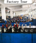 Inside view of factory machinery during a tour with large equipment and conveyor belts.