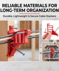 Lothee 200 Pack Red Cable Staples Clips With Steel Nails secured on wooden stud, organizing multiple cables for neat installation.