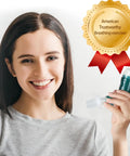 Woman holding Lung Workout Breathing Compact Device With PEP Therapy For Mucus Clearance Portable Handheld Exhalation Trainer Green