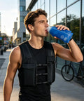 Man wearing High Visibility Reflective Running Vest Hydration Backpack Plus 500ml Soft Flask Hands Free All Day Lightweight Gear