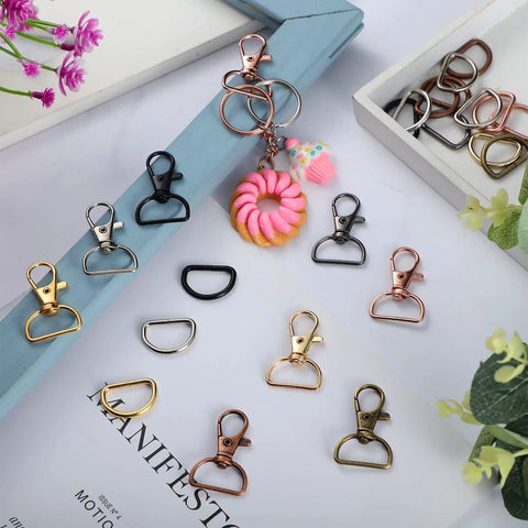 100 Piece Hardcore Swivel Keychain Clips With D Rings And Lobster Clasps 24mm Snap Hooks in various colors arranged on a flat surface.