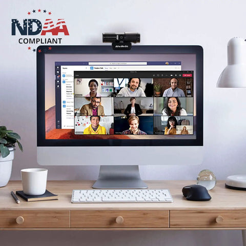 Top Tier 1080P Usb Webcam With Slick Privacy Shutter dual onboard mics mounted on a desktop monitor during a video call