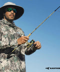 Angler holding Spartacus Defender Twin Tip Fishing Rod And Reel Combo 7 Foot Medium Heavy With 3000 Reel Backup Tip in action.