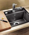 Kitchen sink with installed EZ Mount Garbage Disposal Sink Flange Kit With Splash Guard For Waste King, stainless steel, 4.5 inch diameter