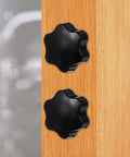 Four Pack Top Shelf M10X25MM Star Clamping Knobs With 38Mm Plastic Handles For Industrial Machinery And Tooling Applications Featuring No Sweat Quick Adjustments And Pro Grade Sweet Grip Design For Shop Ready Projects mounted on wooden surface.