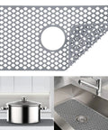Center Drain Silicone Sink Mat No Slip Heat Resistant For Kitchen And RV Sinks, gray mat with center hole on counter and sink.