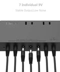 7 Way Isolated Guitar Pedal Power Supply With 9V 100mA Ports For Six Pedals And 9V 300mA Port For One, Plus 2 AC Outlets