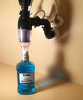 Under-sink view of No Mess Money Saving P Trap 2 Pack In Black And Transparent Easy To Install Under Sink Plumbing Upgrade with mouth rinse