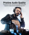 DJ using wired in-ear monitor amplifier with XLR and TRS inputs, mono and stereo modes, crystal-clear sound for drummers, bands.