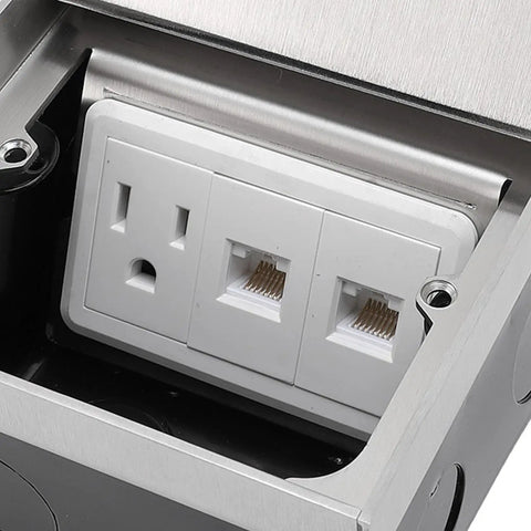 Recessed Floor Power Outlet Box With Snap Open Lift Cover, Tough Steel Housing, dual outlets and data ports in stainless steel housing.