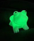 Glowing green frog-shaped Ultra Cute Frog LED Night Light for Kids Room with Automatic Color Changing LEDs