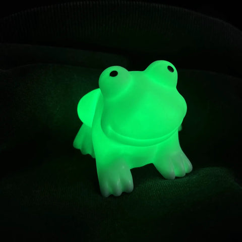 Glowing green frog-shaped Ultra Cute Frog LED Night Light for Kids Room with Automatic Color Changing LEDs