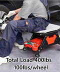 Mechanic using garage creeper with 2.5 Inch Caster Wheels Set Of 12 For Creeper And Mechanics Stool Replacement Heavy Duty
