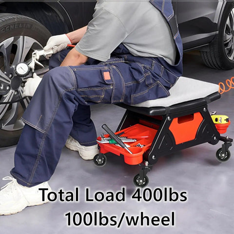 Mechanic using garage creeper with 2.5 Inch Caster Wheels Set Of 12 For Creeper And Mechanics Stool Replacement Heavy Duty