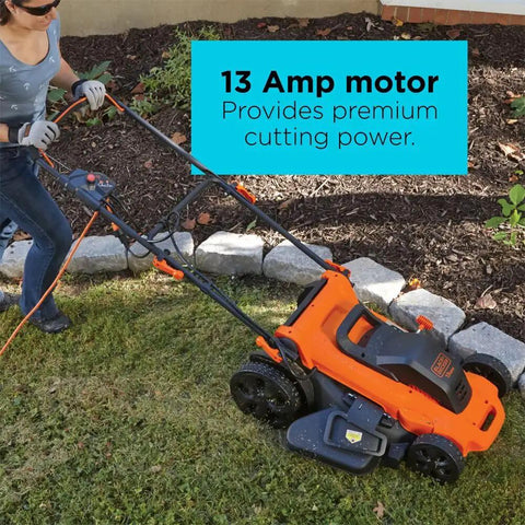 Person using 20 Inch Corded Electric Lawn Mower With 13 Amp Motor Ultra Light No Sweat Push Design on lawn.