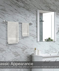 Bathroom with Must-Have 8-Piece Bathroom Hardware Set In Brushed Nickel, featuring 14/24 inch towel bar holding white towels.