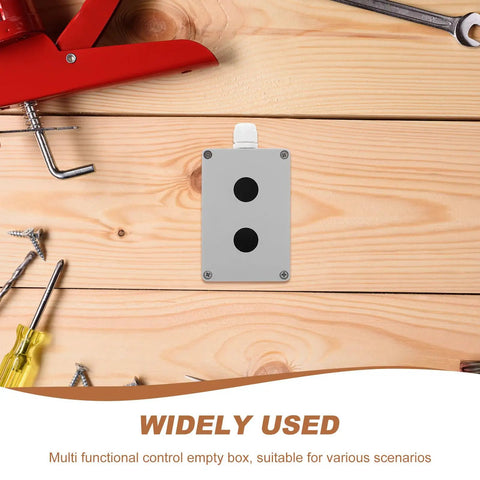 Metal Push Button Control Box With Emergency Stop Cover For Industrial Outdoor Use 2 Hole Cast Aluminum Switch Enclosure Rugged Weatherproof Design Easy Install Built To Last In Harsh Environments on wood board