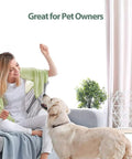 Woman with dog indoors, promoting True High Efficiency Air Filter Replacement That Matches Original Performance At Half The Cost