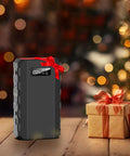 Go To 88Wh Portable Power Station With 24000mAh Battery, decorated with a red ribbon, beside a Christmas gift box.