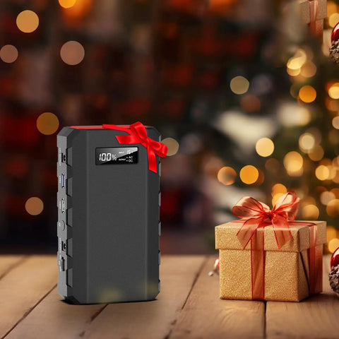 Go To 88Wh Portable Power Station With 24000mAh Battery, decorated with a red ribbon, beside a Christmas gift box.