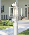 Dusk To Dawn Outdoor Post Light With Pier Mount Base, white weatherproof lantern with auto on off sensor in garden setting