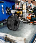 Heavy Duty Extension Cord Reel With Pro Grade Industrial Plastic Build Tangle Free Winding on garage workbench