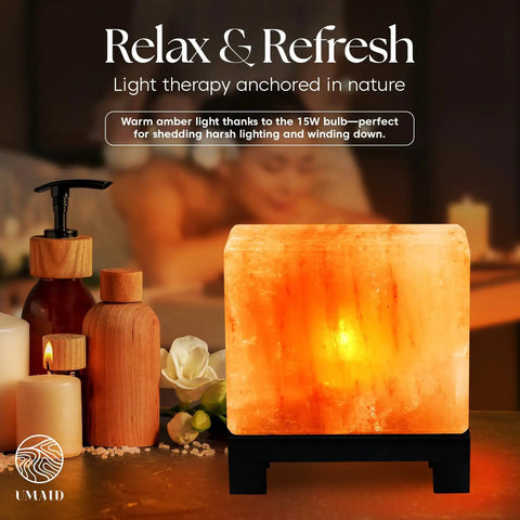 Himalayan Salt Lamp Rectangle In Natural Pink Rock With Wood Base Dimmable Cord Night Light glowing on a spa table