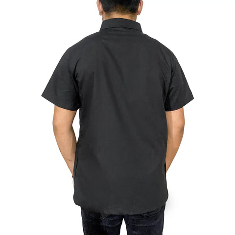 Back view of a man wearing a Slick Half Sleeve Barber Jacket Zip Front Men Salon Smock Lightweight Black Hairdresser Uniform.