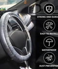 100 Pack Disposable Steering Wheel Covers With Elastic Fit for Cars, Trucks, and Vans installed on steering wheel in vehicle interior