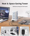 Power Strip Surge Protector Tower With 12 AC Outlets And 4 USB Ports Including USB C on desk, neat cable management