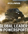 Polaris off-road vehicle driving through dusty landscape, showcasing power and performance. Global Leader in Powersports.