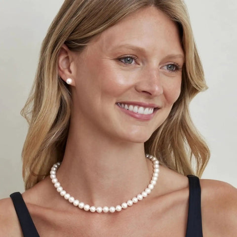 Woman wearing Japanese Akoya Pearl Pendant Necklace For Women, 8.5-9mm White Cultured Pearl AA+ Grade, 14K Yellow Gold, 18 Inch Chain.