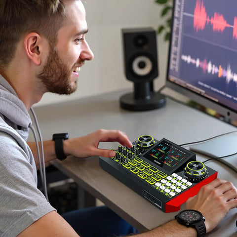 User adjusting Pro Gaming Audio Mixer For Streaming And Podcasting With Built In Voice Changer USB Audio Interface on desk